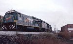 Seaboard System U36B #5714, GP38-2 #4096, U33B #5611, B23-7 #5146, U23B #2734, U30B #5543 & U33B #1746 lead northbound train #384 thru downtown 